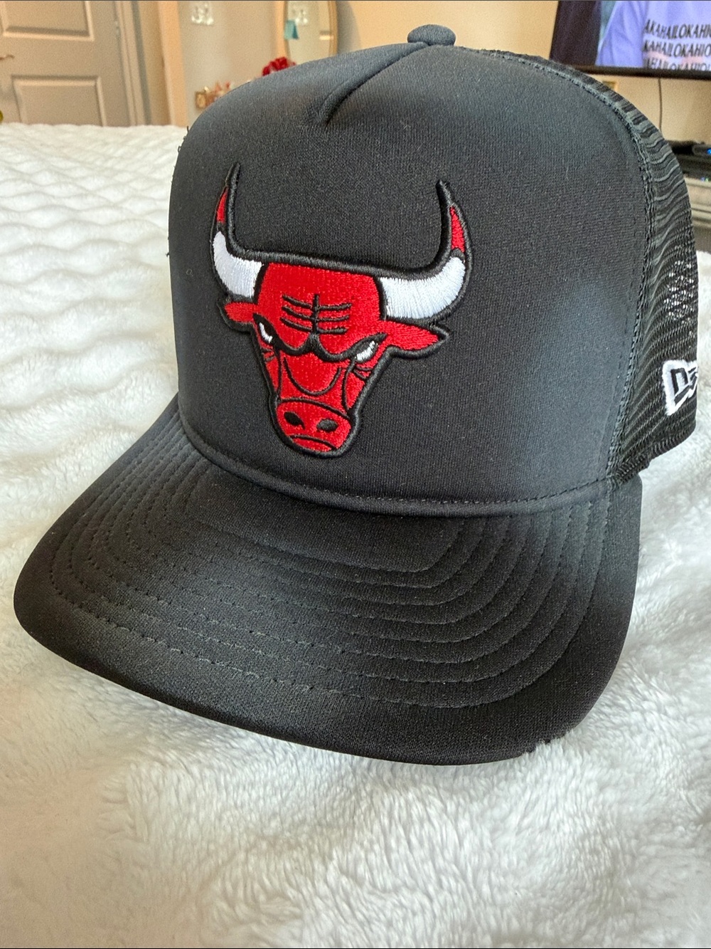 New Era Black Trucker Hat with Red and White Bulls Logo